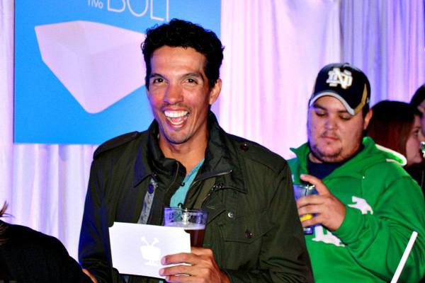 happy person holding beer and free TiVo bolt pass