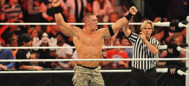 WWE wrestler victory with referee